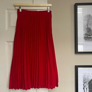 Pleated red skirt